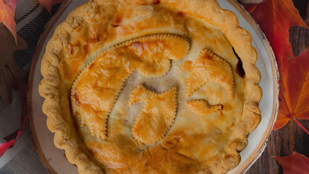 Pie with Hawkeye logo in the crust
